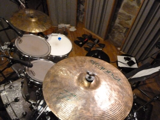 Studio room microphones capturing natural cymbal decay and ambience